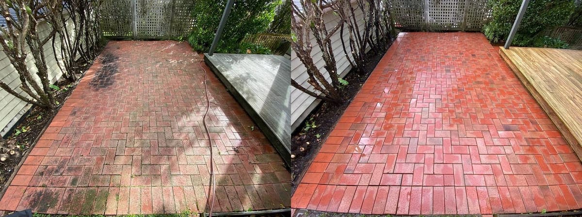 Patio cleaning in Northland, before and after, paver or brick surface restored from weathered grey to clean original colour