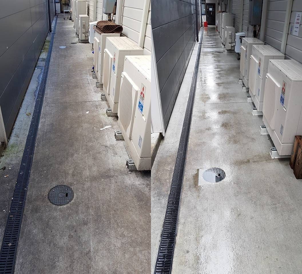 Commercial cleaning in Whitby, commercial service alleyway with air-conditioning condenser units, dirty concrete before, clean wet concrete after