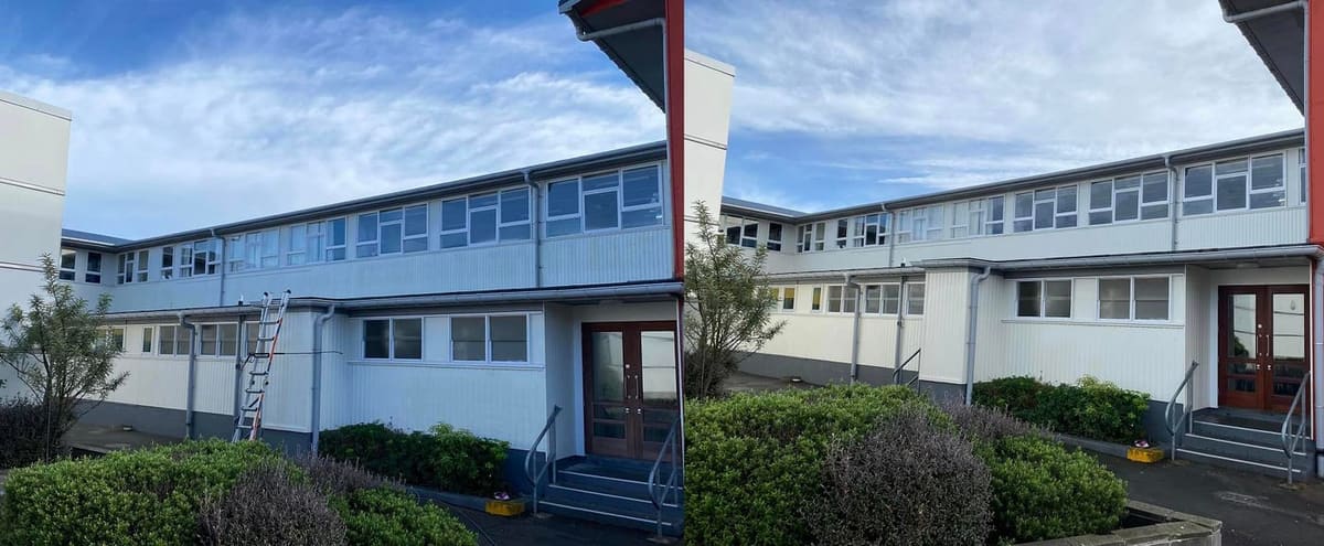 Wellington school exterior cleaning at Newlands College, two storey B Block classroom building softwashed, biocide treated and rinsed across pale cladding and window banks, ready for the new term.