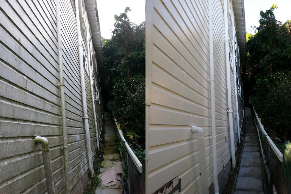 House washing in Northland, before and after a soft-wash treatment, exterior cladding lifted clean of moss, algae and weathering