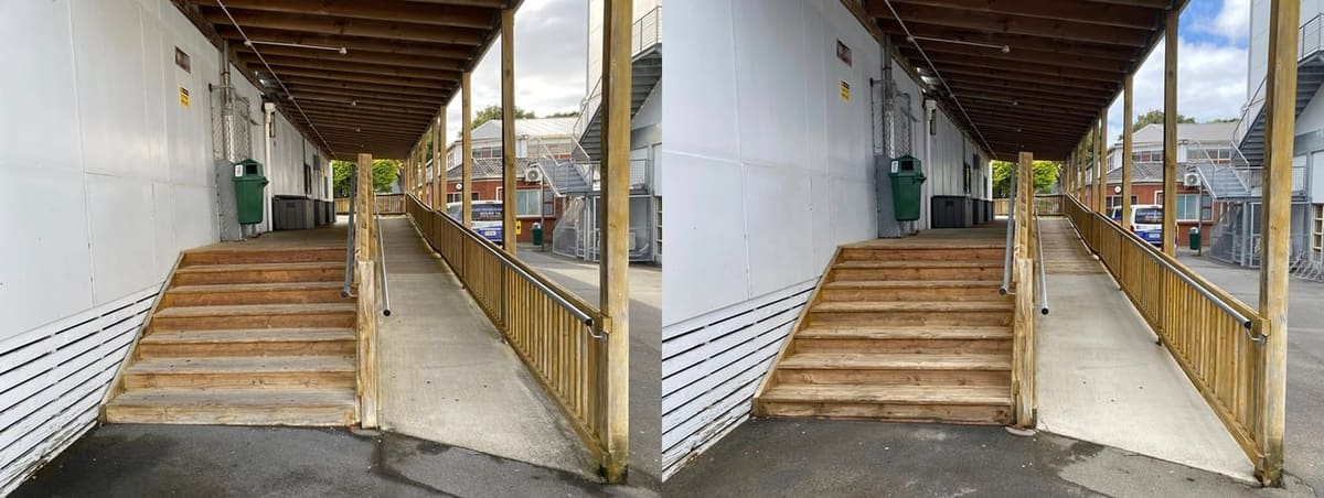 Wellington school exterior cleaning at Wellington High School, covered walkway with timber stairs and steel handrail softwashed, weather staining lifted from treads and adjacent metal cladding.