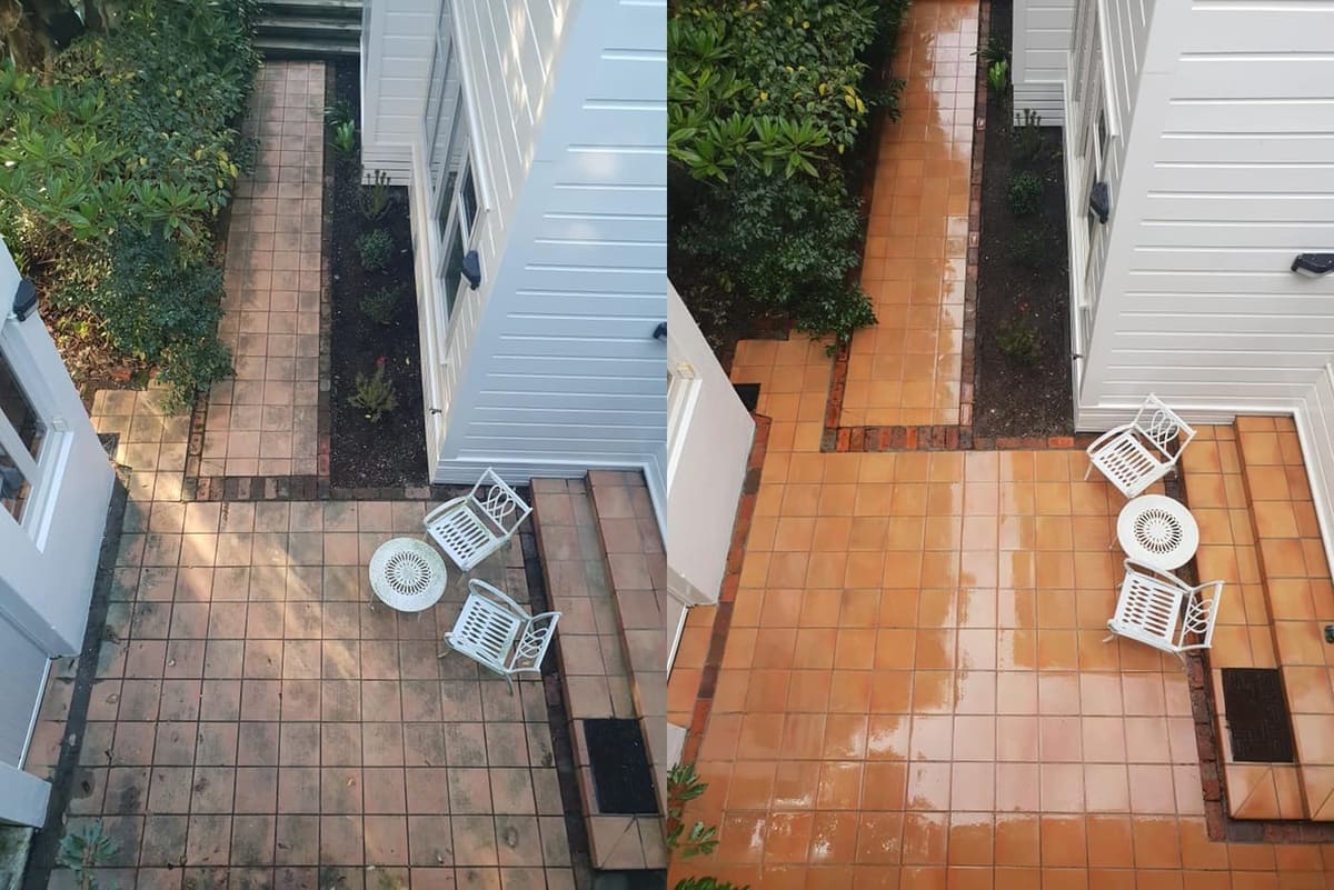 Patio cleaning in Thorndon, before and after, paver or brick surface restored from weathered grey to clean original colour